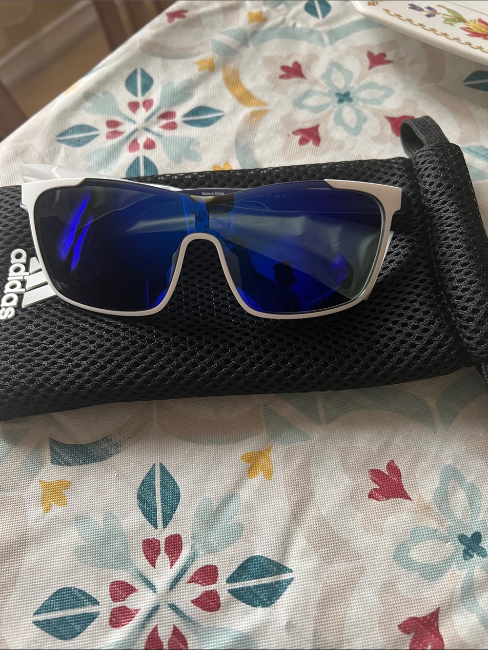 adidas White Frame Sunglasses with Blue Mirrored Lenses